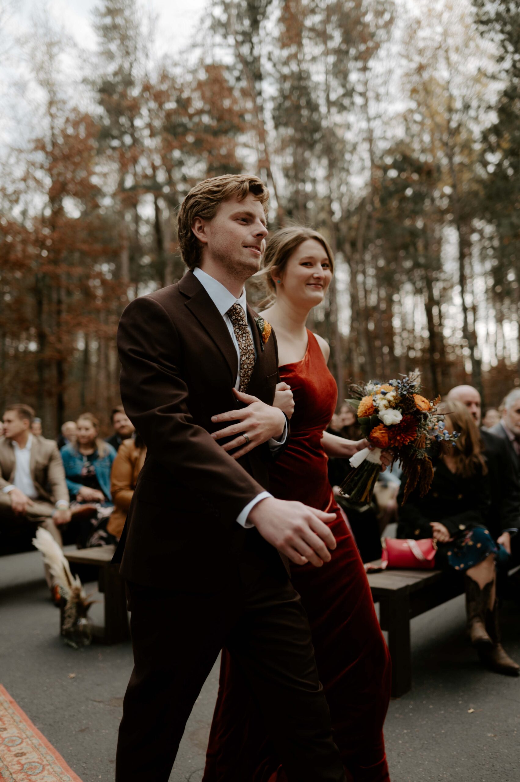 Natalie Tyler Photography wedding ceremony down the aisle candid